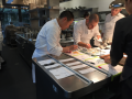 chef lee and chef de cuisine at the pass